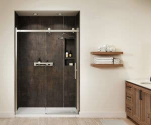 a remodeled shower with dark brown walls, shelving, and rainfall showerhead
